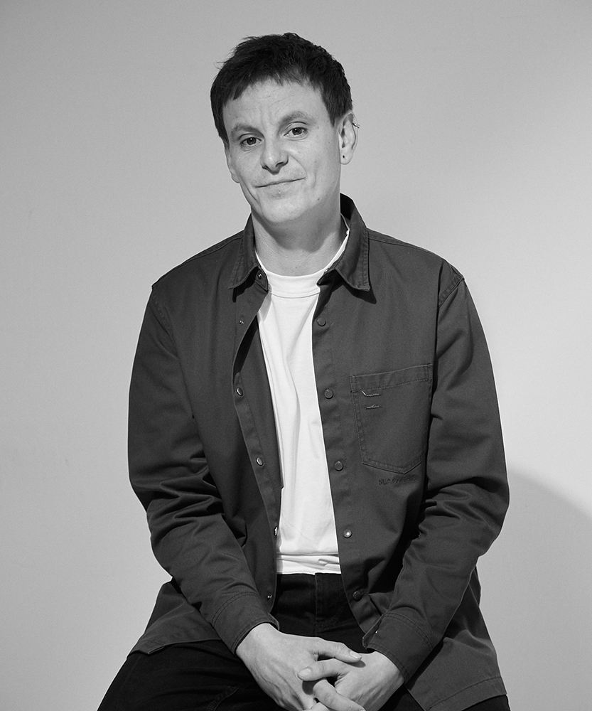 Steve Jurado, stood against white background at SHED london photography studio and desk space